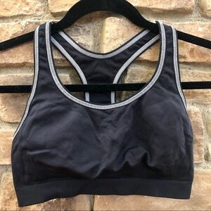 Champion black Razorback sports bra with white stitching.  Large